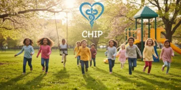 Happy children playing outdoors, symbolizing health and well-being supported by the CHIP program.